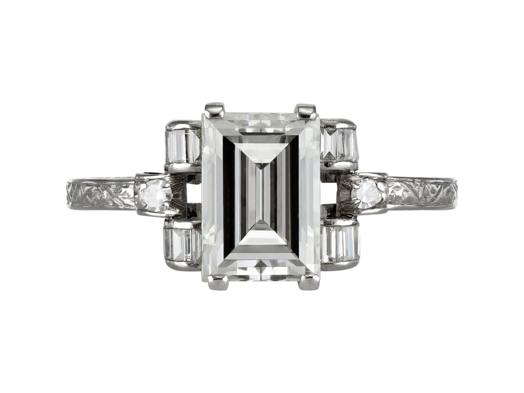 Diamond flanked solitaire, circa 1935.