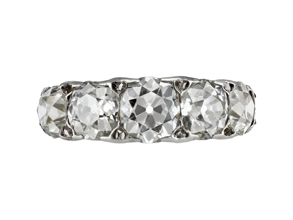 Cushion shape old mine diamond five stone ring, early 21st Century. 