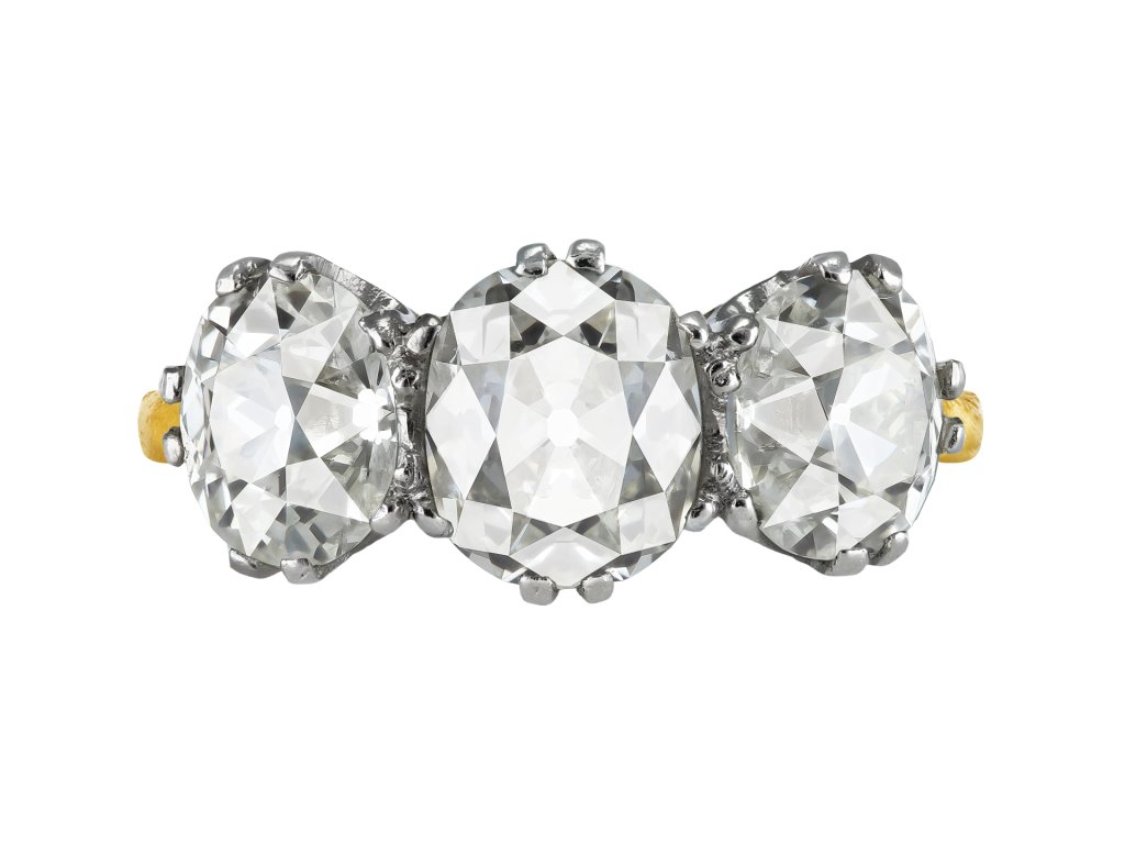 Old mine diamond three stone ring, early 20th Century.