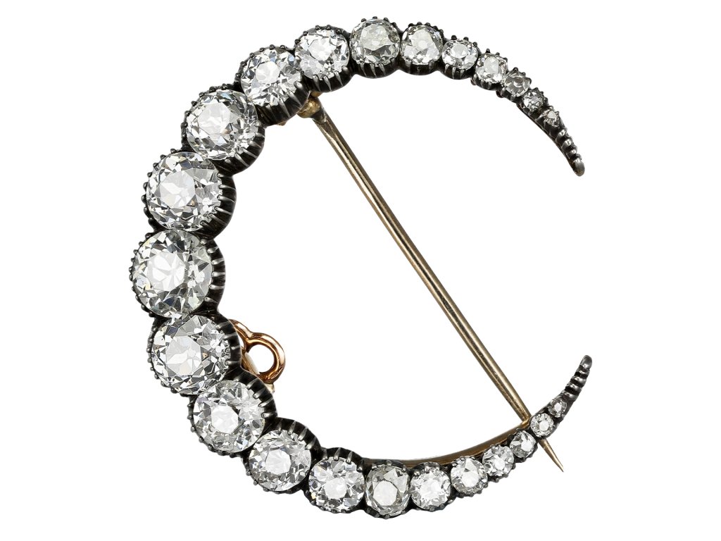 Victorian diamond crescent moon brooch, circa 1890.