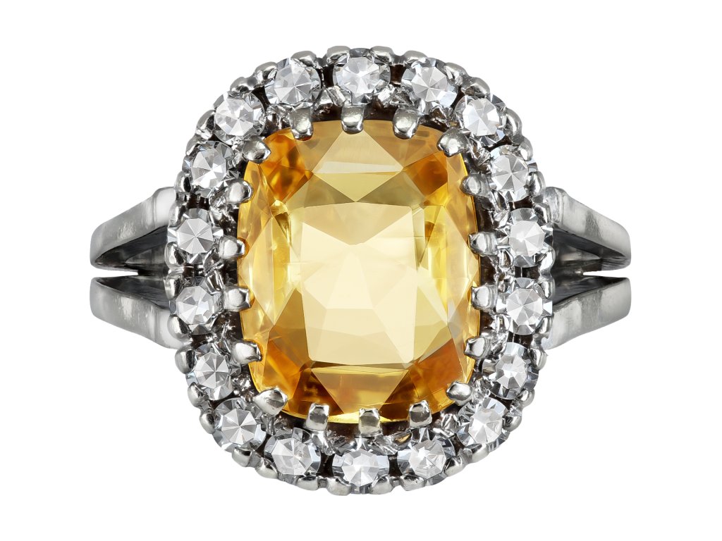 Yellow Ceylon sapphire and diamond coronet cluster ring, mid 20th Century. 