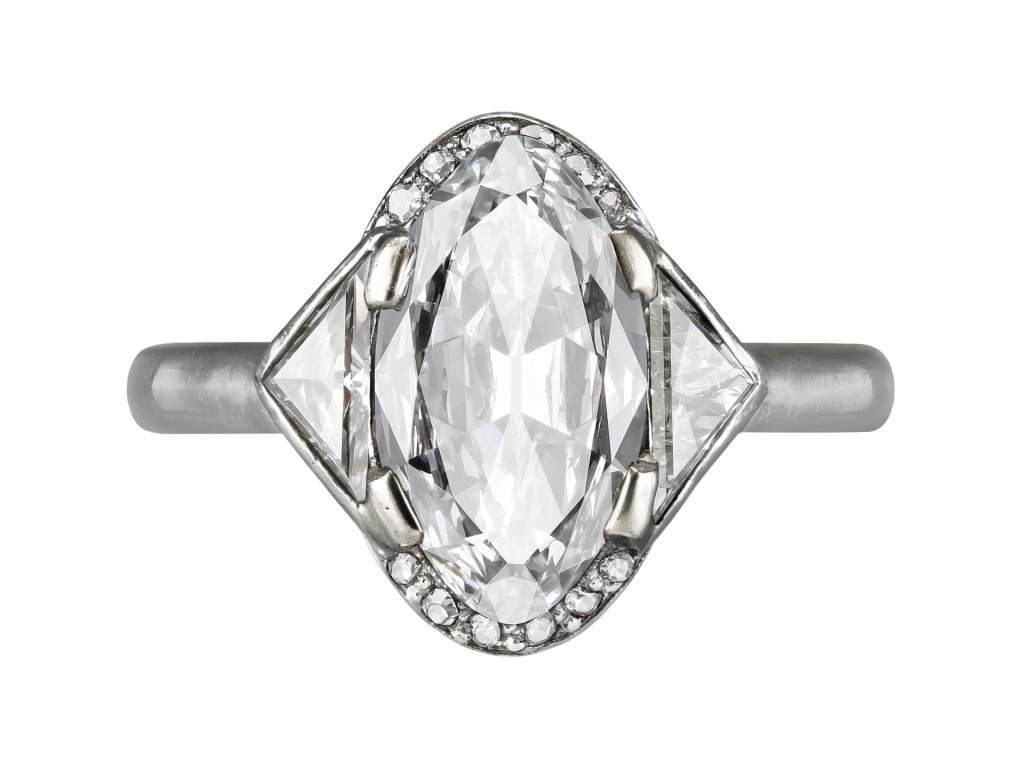 Diamond flanked solitaire, French, circa 1930.