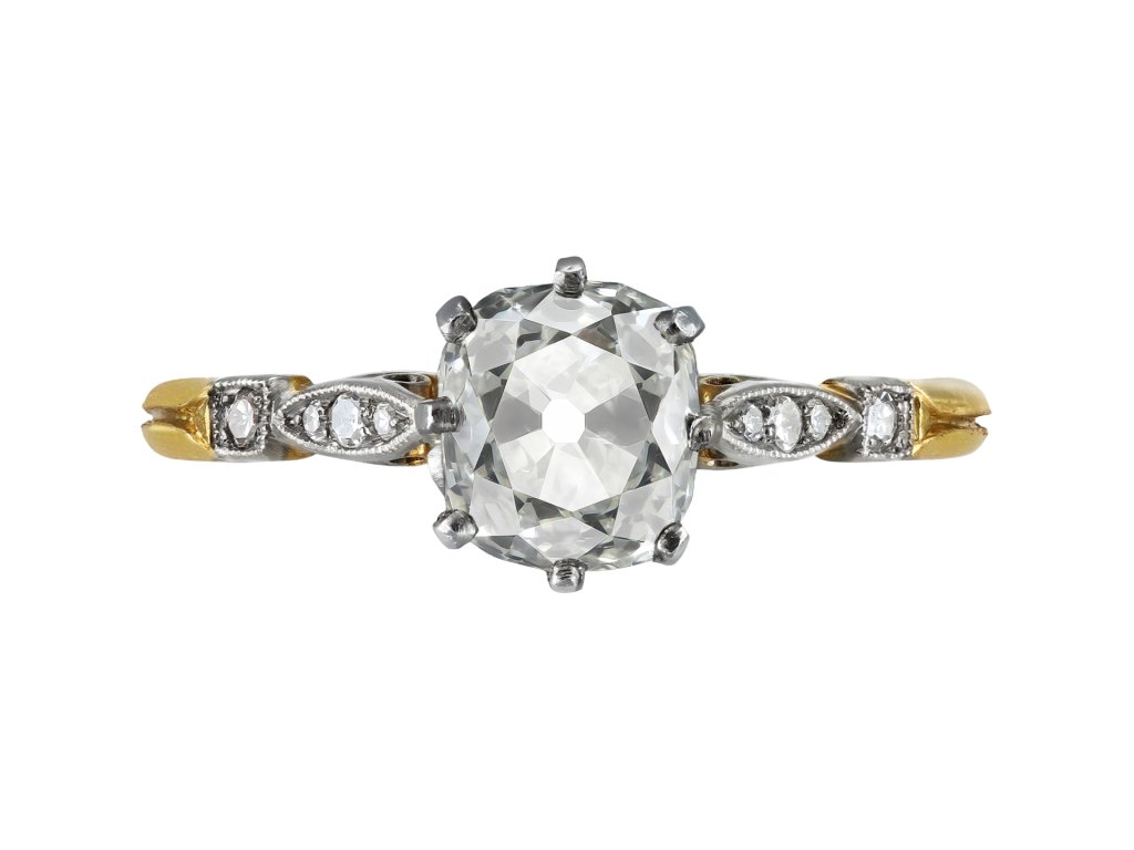 Old mine diamond flanked solitaire ring, early 20th Century.