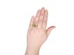 Peridot solitaire ring, circa 1940s. 
