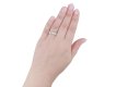 Vintage diamond flanked solitaire ring, circa 1950.