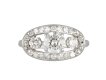 Three stone diamond cluster ring, circa 1950.