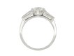 Vintage flanked solitaire diamond ring, American, circa 1950.