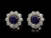 Sapphire and diamond cluster earrings, circa 1980. Hatton Garden