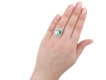 Colombian emerald diamond crossover ballerina ring hatton garden