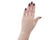 Emerald cut diamond solitaire ring, circa 1970.