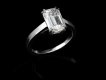 Emerald cut diamond solitaire ring, circa 1970.