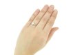 hand view Solitaire old mine diamond ring with baguette shoulders