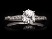 Solitaire old cut diamond ring with diamond set shoulders, circa 1910. Hatton Garden