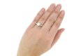 hand view Solitaire diamond engagement ring with diamond set shoulders