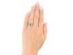 Antique emerald and diamond cluster ring, circa 1915. Hatton Garden