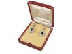 Art Deco onyx and diamond earrings, circa 1920.