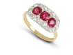 Edwardian Burmese ruby triple cluster ring, English, circa 1910.