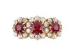 Edwardian ruby and diamond triple cluster ring, English, circa 1905.