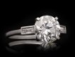 Vintage old cut diamond flanked solitaire ring, English, circa 1950. Hatton Garden