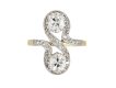 Belle Époque diamond two stone crossover ring, French, circa 1905. 