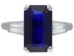 Ceylon sapphire and diamond flanked solitaire ring.