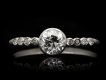 Art Deco diamond flanked solitaire ring hatton garden