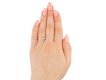 Pink Ceylon sapphire and diamond flanked solitaire ring, circa 1970. Hatton Garden