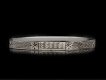 Platinum engraved wedding ring, English, circa 1915.