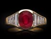 Burmese ruby and diamond flank solitaire ring, circa 1950. Hatton Garden