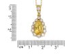 Yellow Ceylon sapphire and diamond pendant hatton garden