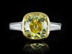 Fancy intense yellow diamond flanked solitaire ring hatton garden