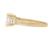 Emerald cut diamond flanked solitaire ring, circa 1970. Hatton Garden