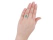 Colombian emerald diamond flanked solitaire ring hatton garden