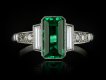 Colombian emerald diamond flanked solitaire ring hatton garden