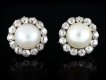 Victorian natural pearl and diamond cluster earrings, circa 1880.