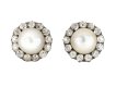 Victorian natural pearl and diamond cluster earrings, circa 1880.
