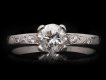 Vintage diamond flanked solitaire ring, circa 1950. Hatton Garden