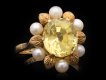 Yellow Ceylon sapphire and pearl ring, circa 1960.