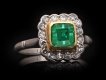 Colombian emerald and diamond coronet cluster ring, circa 1915. Hatton Garden