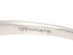 Tiffany & Co. diamond flanked solitaire ring. Hatton Garden
