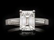 Tiffany & Co. diamond flanked solitaire ring. Hatton Garden