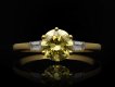 fancy yellow diamond flank solitaire ring. hatton garden.