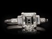 Art Deco diamond flanked solitaire ring, circa 1920. Hatton Garden