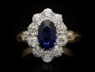 Padparadscha sapphire diamond flanked solitaire ring hatton Garden