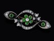 Victorian demantoid garnet and diamond brooch, circa 1880.