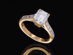 Cartier diamond flanked solitaire ring, French. hatton garden