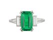 Colombian emerald and diamond flanked solitaire ring, circa 1950