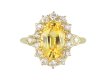 Yellow Ceylon sapphire and diamond coronet cluster ring, circa 1900.