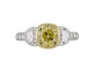 Fancy yellow diamond flanked solitaire ring, circa 1950.