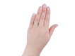 Old Cut diamond flanked solitaire ring, circa 1915.